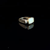 14k Yellow Gold 2.00ct Oval Opal/ .12ct Round Diamond and .10ct Round Rhodolite Garnet Ring